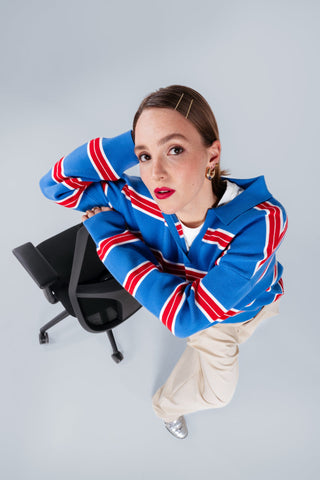 Lifestyle image of a woman on a Se7en Milo office chair, top view
