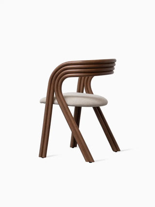 Vincent Sheppard Arc Dining Chair in tobacco stained rattan, rear three-quarter view
