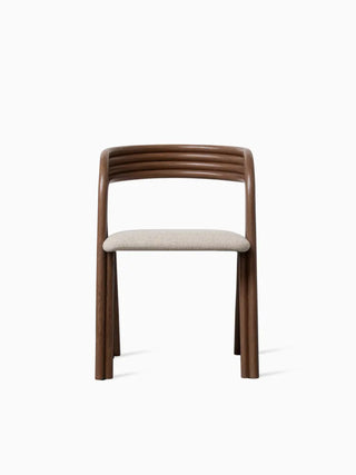 Vincent Sheppard Arc Dining Chair in tobacco stained rattan with white seat cushion, front view