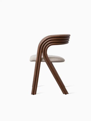 Vincent Sheppard Arc Dining Chair in tobacco stained rattan, side view