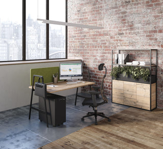 Lifestyle image of Buronomic Alto bookcases in Timber with plants by a desk with green screen